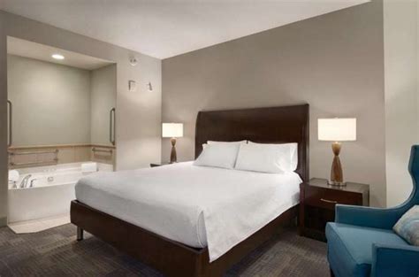 Welcome to the brighter side of travel. . Hilton garden inn jacuzzi suite